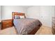 A bedroom with a bed, two nightstands, and carpeted flooring at 264 Creek View Pl, Canton, GA 30114