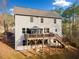 Backyard with a large deck, screened gazebo, and wooded view at 264 Creek View Pl, Canton, GA 30114