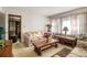 Living room with floral couches and wooden coffee table at 4128 Lindsey Dr, Decatur, GA 30035