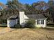 Charming single-story home with a chimney, attached garage, and front yard at 4262 Catalpa Park, Ellenwood, GA 30294