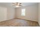 Cozy bedroom with carpeted floors, ceiling fan, and closet at 1301 S Deshon Rd, Lithonia, GA 30058