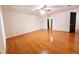 Hardwood floor bedroom with ceiling fan at 1409 Oakridge Cir, Decatur, GA 30033