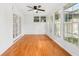 Bright sunroom with wood floors, windows, and French doors at 2579 Bonnybrook Sw Dr, Atlanta, GA 30311