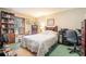 Spacious bedroom with a queen bed and home office at 260 Devilla Trce, Fayetteville, GA 30214