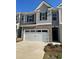 Attractive two-story townhome with a one-car garage at 1110 Cades Walk, Lawrenceville, GA 30045