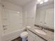 Clean bathroom featuring a shower, toilet, and vanity with granite countertops at 35 Heyman Dr, Covington, GA 30016