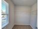 Walk-in closet with wire shelving and window at 35 Heyman Dr, Covington, GA 30016