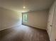 Cozy bedroom with carpet and window at 45 Heyman Dr, Covington, GA 30016