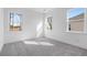 Bright, spacious bedroom with multiple windows offering ample natural light at 1495 Auburn Glen Rd, Dacula, GA 30019