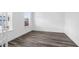 Spacious home office with wood-look flooring and large windows at 1495 Auburn Glen Rd, Dacula, GA 30019