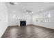 Spacious living room with fireplace and large windows at 1495 Auburn Glen Rd, Dacula, GA 30019