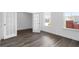Bright office space with wood-look floors and french doors at 1495 Auburn Glen Rd, Dacula, GA 30019