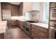 Spacious kitchen featuring custom cabinetry, marble counters, and high-end appliances at 3790 Ivy Ne Rd, Atlanta, GA 30342