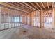 Unfinished basement with framed walls and exposed beams at 772 Old Lathemtown And 776 Rd, Canton, GA 30115