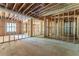 Unfinished basement with framed walls and windows at 772 Old Lathemtown And 776 Rd, Canton, GA 30115