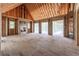 Grand great room with high ceilings, fireplace, and access to outdoor space at 772 Old Lathemtown And 776 Rd, Canton, GA 30115