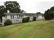 Ranch style home with large deck and expansive lawn at 772 Old Lathemtown And 776 Rd, Canton, GA 30115