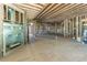 Large living room with fireplace and high ceilings, currently under construction at 772 Old Lathemtown And 776 Rd, Canton, GA 30115