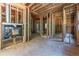 Living room with fireplace, in the framing stage of construction at 772 Old Lathemtown And 776 Rd, Canton, GA 30115