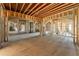 Expansive living area with arched doorways; framing in progress at 772 Old Lathemtown And 776 Rd, Canton, GA 30115