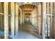 Long hallway with arched doorways under construction at 772 Old Lathemtown And 776 Rd, Canton, GA 30115