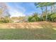 Large, grassy backyard extending into the distance at 1347 Peggy Nw Ln, Conyers, GA 30012