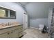 Bathroom includes granite countertop, updated vanity, and tiled flooring at 2290 Loring Oak Nw Pl, Marietta, GA 30064