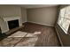Bright living room with fireplace and wood-look flooring at 926 Westland Dr, Marietta, GA 30064