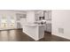 Modern kitchen with gray cabinets and granite countertops at 1029 Cades Walk, Lawrenceville, GA 30045