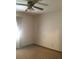 Bright bedroom with ceiling fan and carpeted floors at 3594 Broxton Ln, Snellville, GA 30039