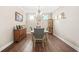 Formal dining room with hardwood floors and a chandelier at 185 Hollis St, Fayetteville, GA 30215