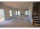 Open living room featuring a fireplace and large windows at 101 Azalea Dr, Villa Rica, GA 30180