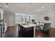 Open kitchen features an island and overlooks dining area at 162 Alday Ln, Marietta, GA 30060