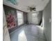 Bedroom with tile flooring, ceiling fan, and two windows at 202 Hayes Street St, Villa Rica, GA 30180