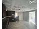 Dark wood cabinets, microwave, and tile floor in the kitchen at 202 Hayes St, Villa Rica, GA 30180