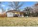 Newly renovated home with a spacious front yard and modern design at 1819 Pennington Se Pl, Atlanta, GA 30316