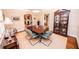 Formal dining room with hardwood floors, a large table, and a china cabinet at 210 Jeanette St, Canton, GA 30114