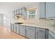 Well-appointed kitchen featuring sleek appliances, granite countertops, and ample cabinetry at 305 Haley Cir, Atlanta, GA 30349