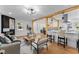 Inviting living room with fireplace, modern furniture, and wood floors, open to kitchen at 1986 Twin Falls Rd, Decatur, GA 30032