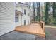 Spacious deck with wooden railings and steps at 3337 Oak Dr, Snellville, GA 30078