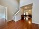 Spacious foyer with hardwood floors and view into the living room at 2772 Sedgeview Ln, Buford, GA 30519