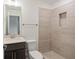 Modern bathroom with tiled shower and dark wood vanity at 2215 Nena Way # 20, Tucker, GA 30084