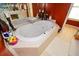 Bathroom with a large oval jetted tub at 4754 Ivy Ridge Se Dr # 1, Atlanta, GA 30339