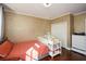 Bright bedroom with a crib and plenty of closet space at 4754 Ivy Ridge Se Dr # 1, Atlanta, GA 30339