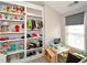 bedroom with built-in shelves and window seat at 4754 Ivy Ridge Se Dr # 1, Atlanta, GA 30339