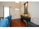 Bright entryway with hardwood floors and decorative console table at 4754 Ivy Ridge Se Dr # 1, Atlanta, GA 30339
