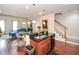 Open concept kitchen with island and views into the living area at 4754 Ivy Ridge Se Dr # 1, Atlanta, GA 30339