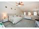 Large main bedroom with high ceilings, ceiling fan, and a walk-in closet at 4754 Ivy Ridge Se Dr # 1, Atlanta, GA 30339