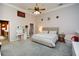 Spacious main bedroom with high ceilings and a ceiling fan at 4754 Ivy Ridge Se Dr # 1, Atlanta, GA 30339