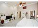 Spacious main bedroom with high ceilings, a ceiling fan, and a view of another room at 4754 Ivy Ridge Se Dr # 1, Atlanta, GA 30339